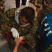 Peshmerga soldiers practice combat lifesaver skills under the supervision of German trainers