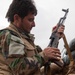 Peshmerga soldiers practice defensive tactical skills under the supervision of German trainers