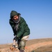 Peshmerga soldiers make fox holes and practice defensive tactical skills under the supervision of German trainers