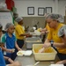 Sailors assigned to Commander Logistics Group Western Pacific, Task Force 73 volunteer at Willing Hearts Soup Kitchen