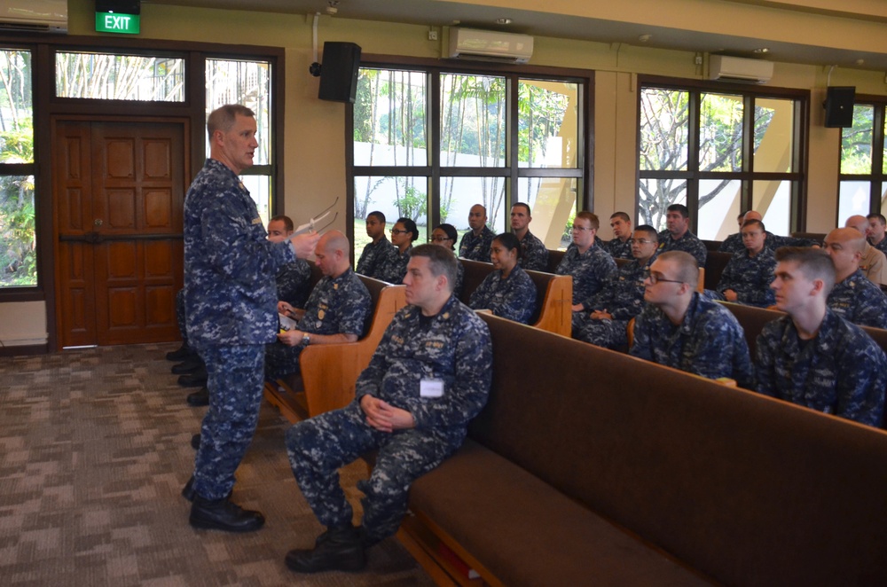 U.S. 7th Fleet Master Chief Crispian Addington conducts an All Hands Call