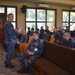 U.S. 7th Fleet Master Chief Crispian Addington conducts an All Hands Call