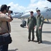 Sailors attached to squadron VP-16 pose for photos during the Singapore International Airshow