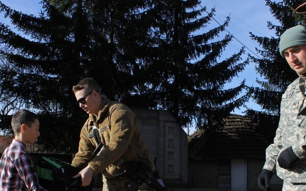 US Soldiers deliver school supplies to children in Kosovo