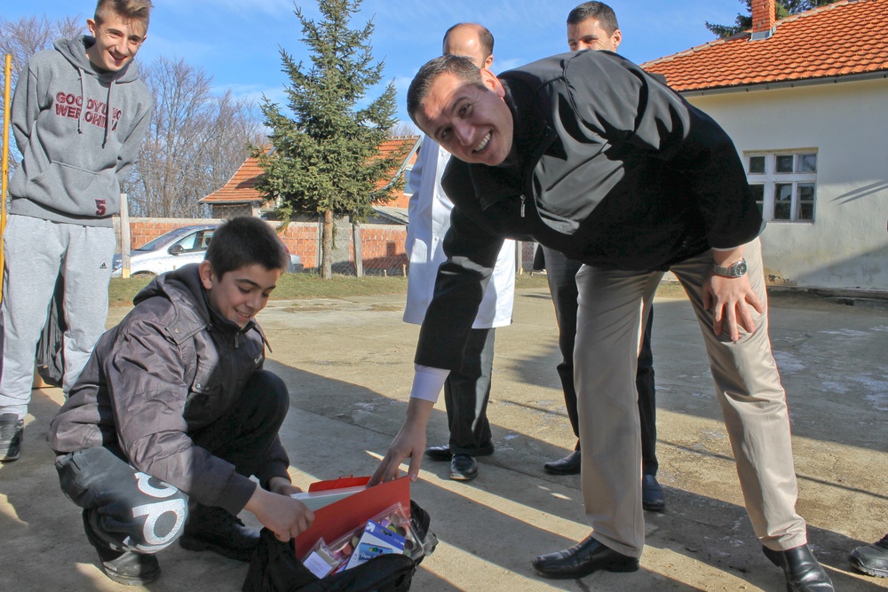 US Soldiers deliver school supplies to children in Kosovo