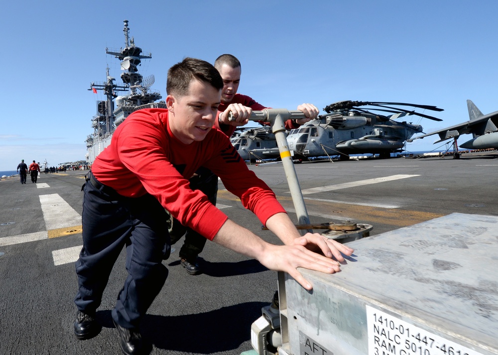 Missile upload evolution aboard USS Boxer