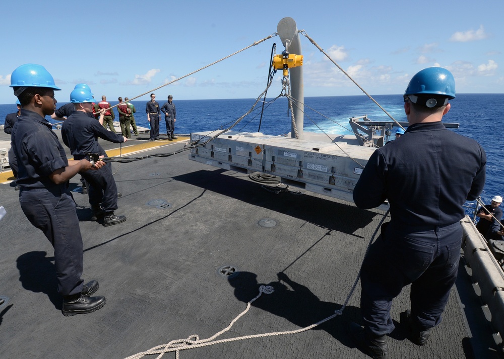 Missile upload evolution aboard USS Boxer