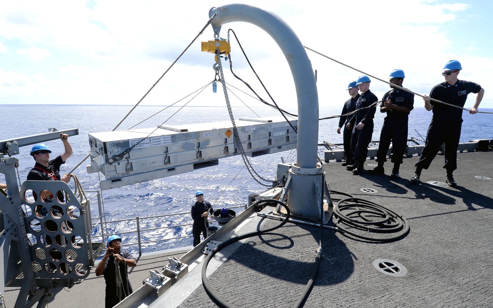 Missile upload evolution aboard USS Boxer