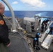 Missile upload evolution aboard USS Boxer