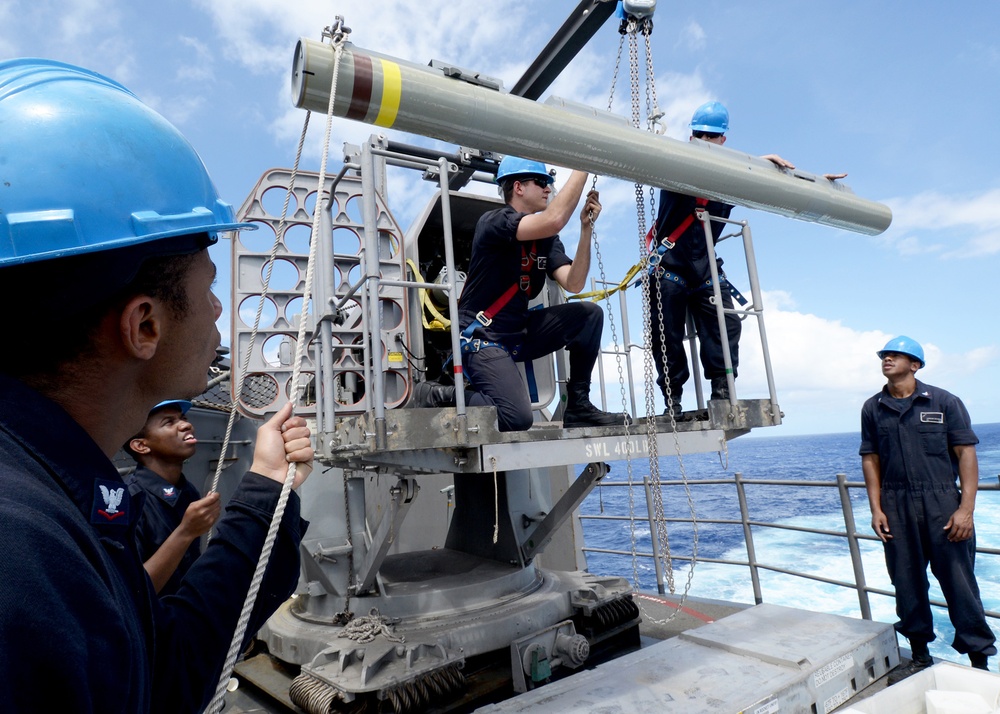 Missile upload evolution aboard USS Boxer