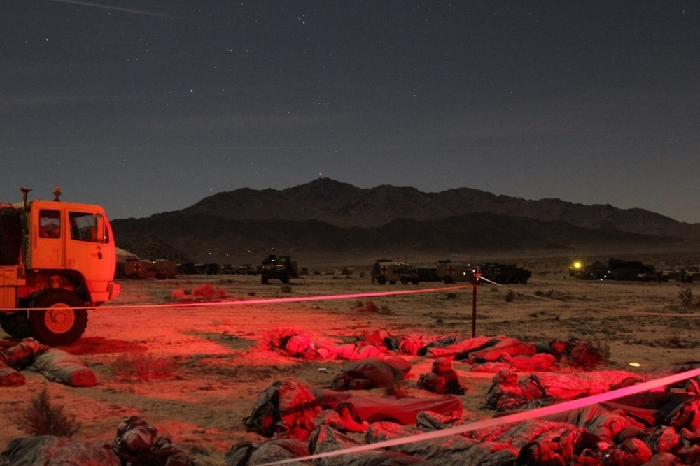 Soldiers sleep in a Personnel Holding Area