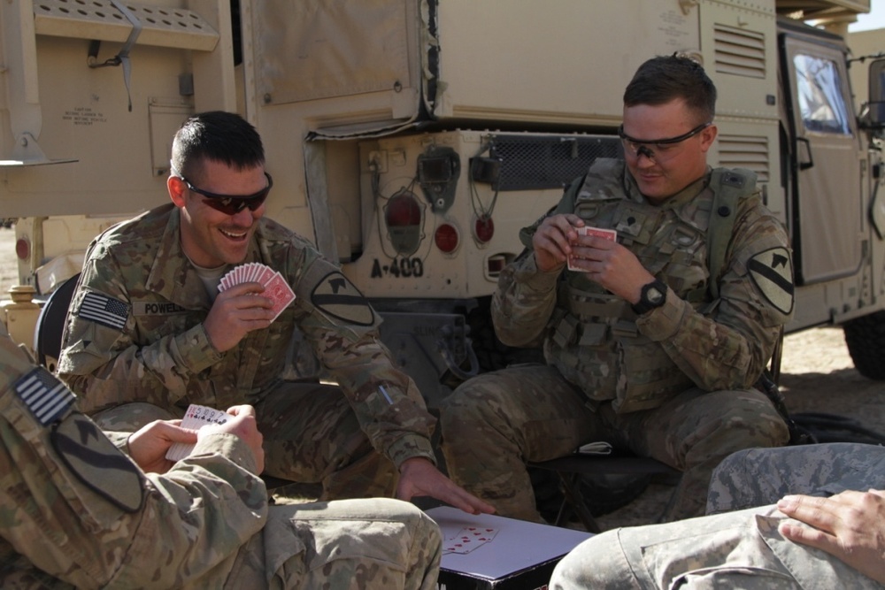 Soldiers play cards