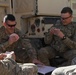 Soldiers play cards