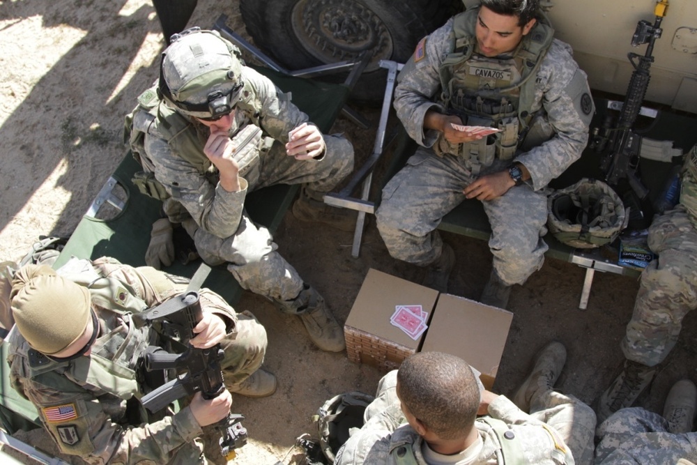 Soldiers play cards