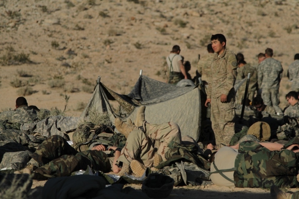 Soldiers rest in a Personnel Holding Area