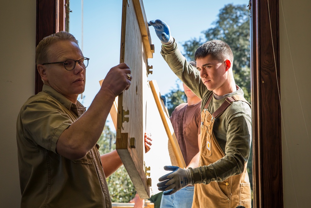 Volunteers help community bring a piece of history home