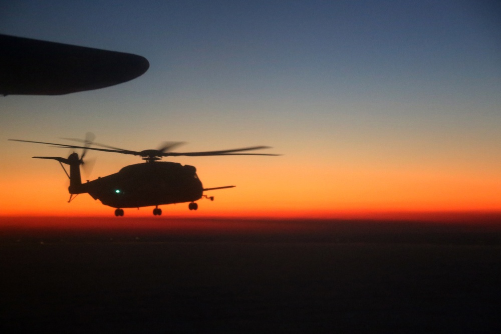 VMGR-252 soars through evening sky during aerial refuel training