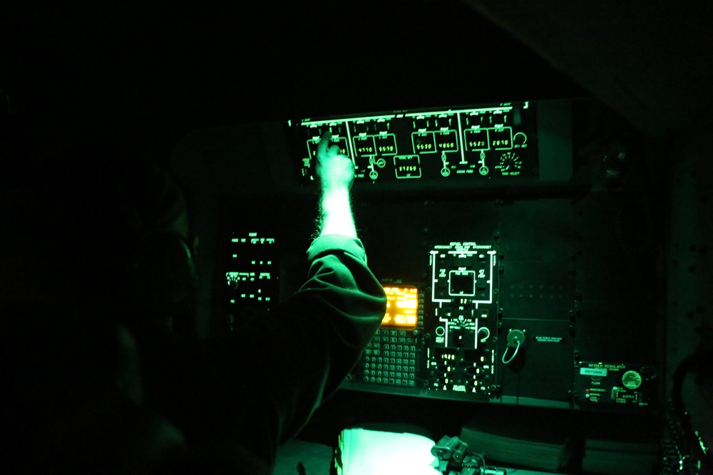 VMGR-252 soars through evening sky during aerial refuel training