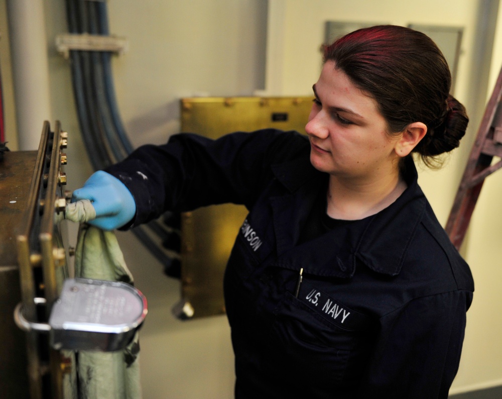 PCU Gerald R. Ford Sailors working aboard ship