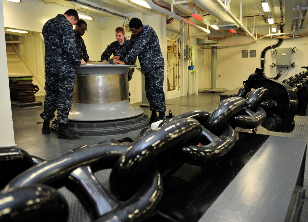 PCU Gerald R. Ford Sailors working aboard ship