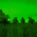 Paratrooper infantry does a night linkup