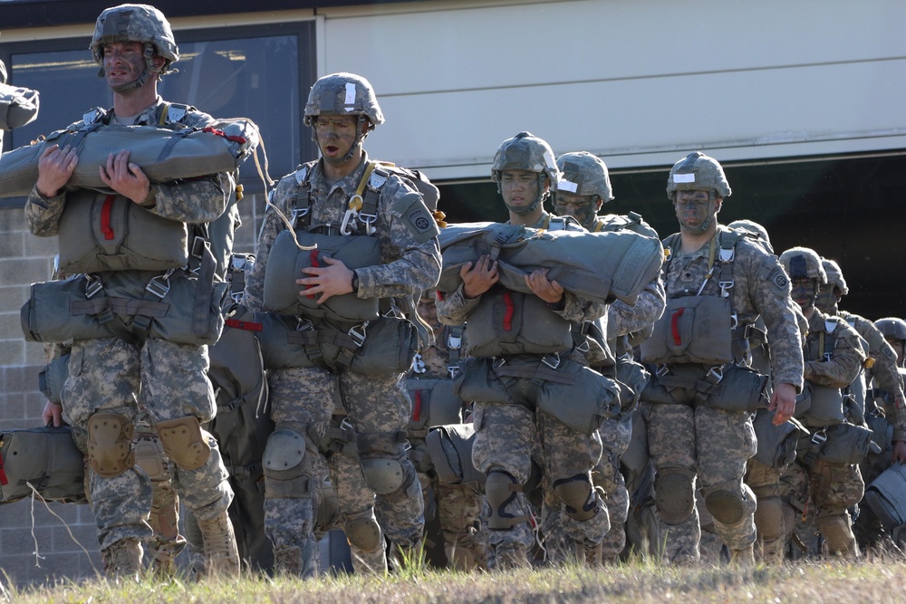 Paratroopers board an aircraft