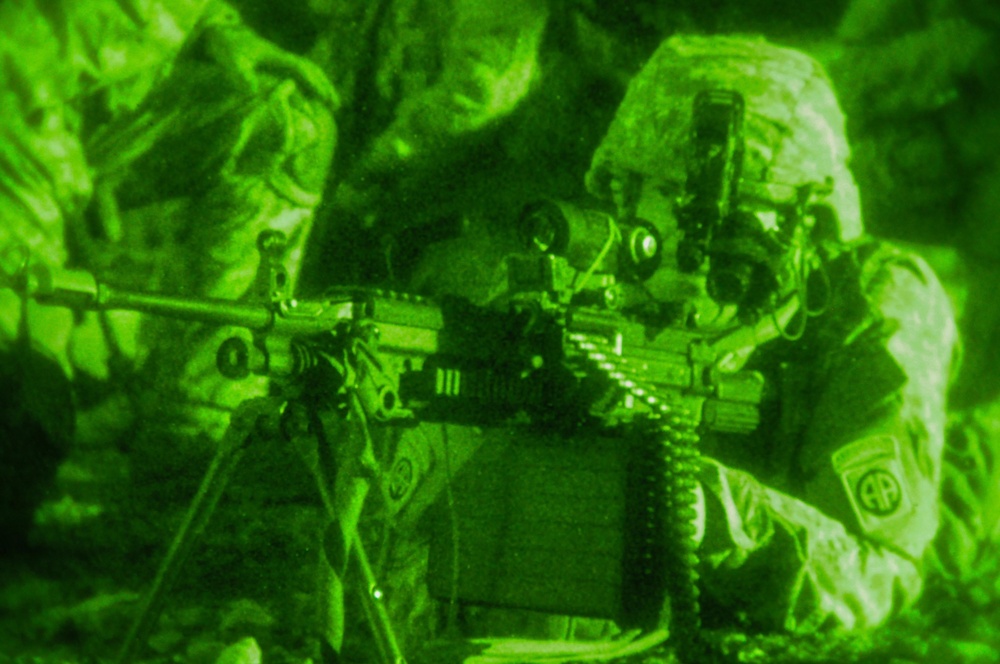 Paratrooper conducts night security