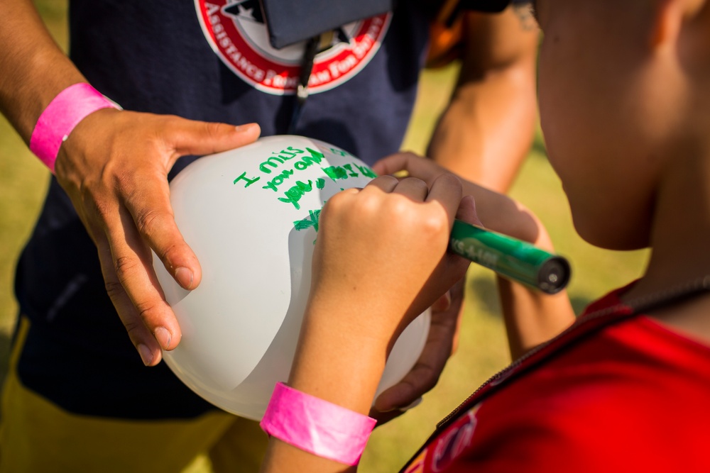 Friends And Family Participating in TAPS Remember the 12 Marines from HMH-463