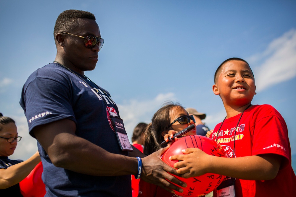 Friends And Family Participating in TAPS Remember the 12 Marines from HMH-463