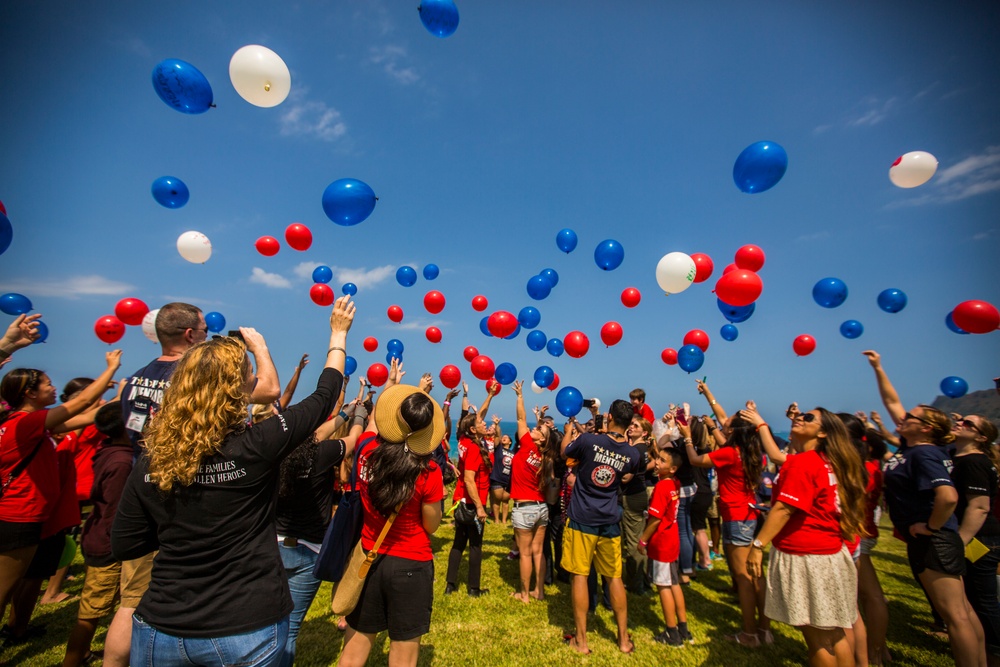 Friends And Family Participating in TAPS Remember the 12 Marines from HMH-463