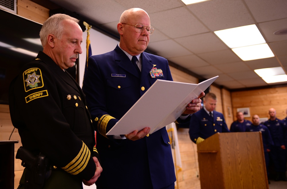Coast Guard presents Certificate of Valor to Sheriff in Oregon