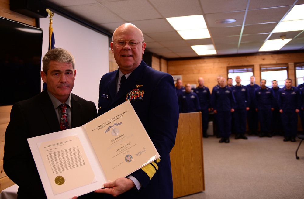 Coast Guard presents the Silver Life Saving Medal to volunteer officer