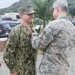 History made at GTMO: Coast Guardsman earns Navy warfare pin