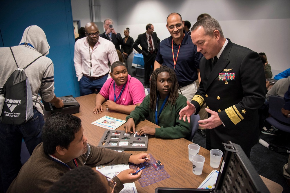 Chief of Naval Research/Director, Innovation Technology Requirements and Test &amp; Evaluation (N84) chats with young men