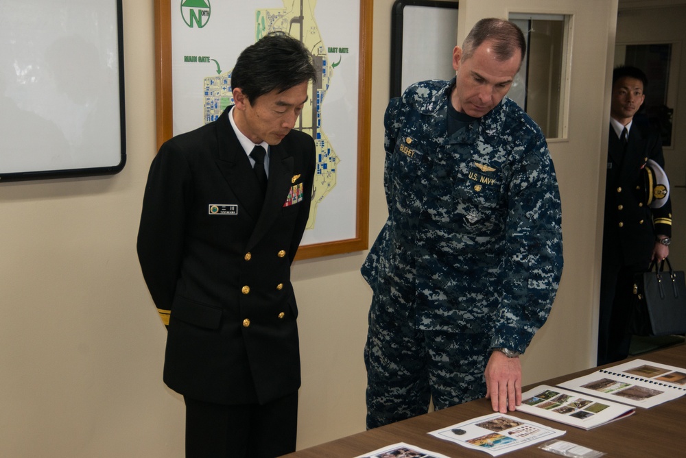 NAF Atsugi CO and JMSDF rear admiral view recovered artifacts