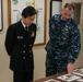 NAF Atsugi CO and JMSDF rear admiral view recovered artifacts