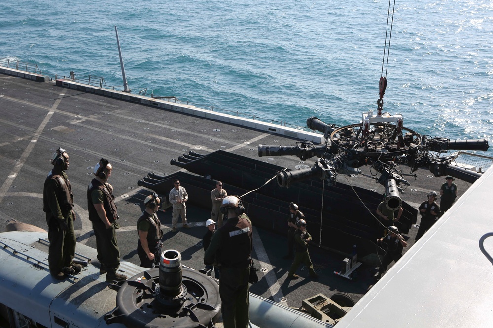 Marine Medium Tiltrotor Squadron (VMM) 162 (Reinforced) replacing main rotor head aboard the USS Arlington