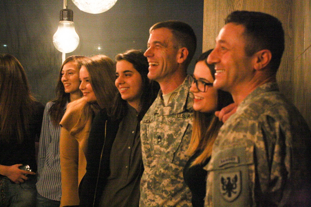 US Army Soldiers celebrate, Kosovo students pass English-speaking test