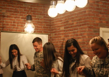 US Army Soldiers celebrate, Kosovo students pass English-speaking test