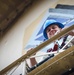 Going up: Airmen climb water tower