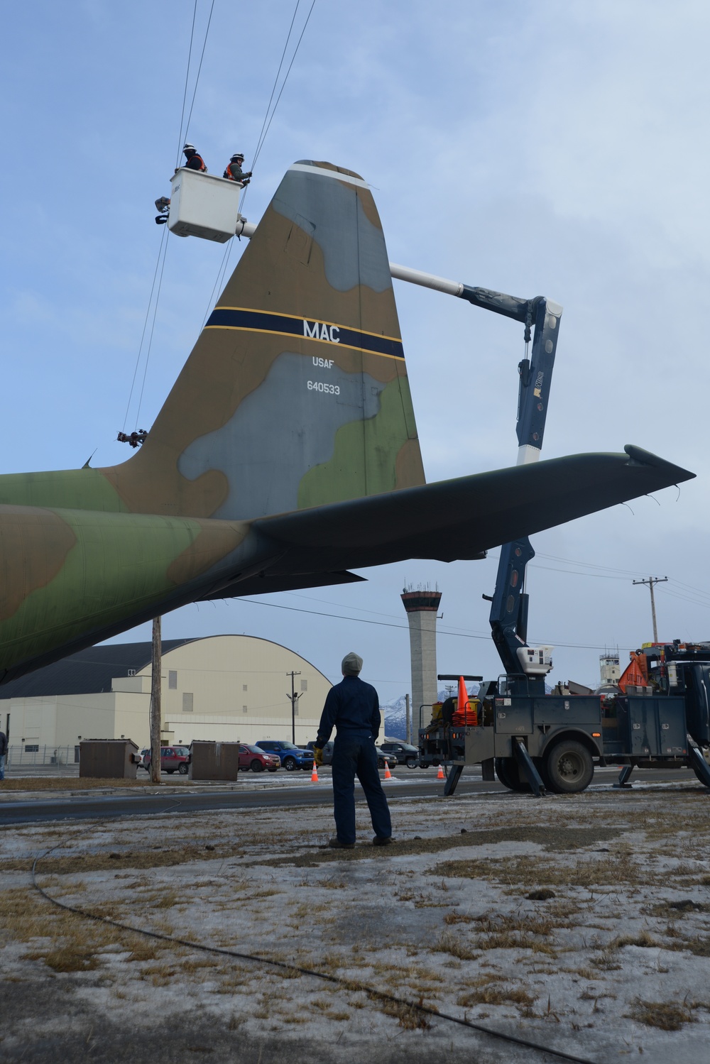 JBER tows static C-130 for restoration