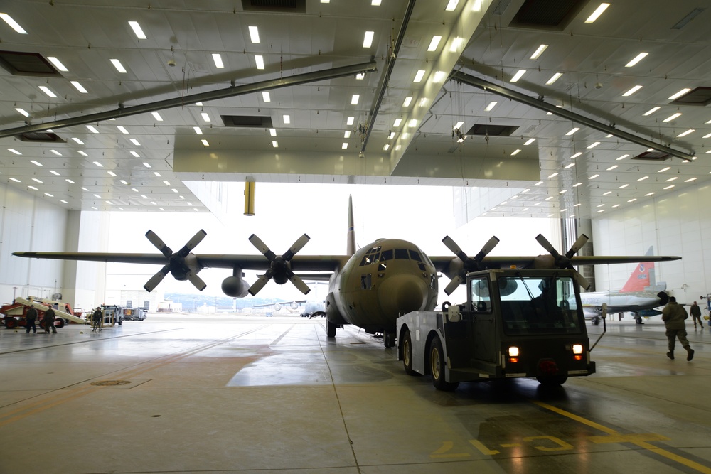 JBER tows static C-130 for restoration