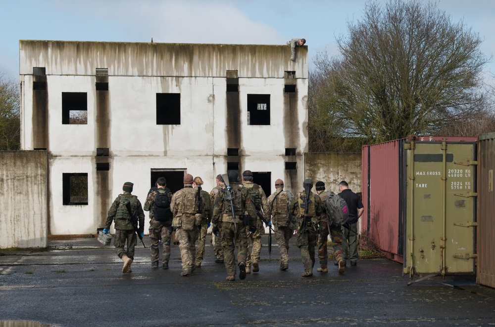 US Airmen role-play in a Special Operations Forces Training