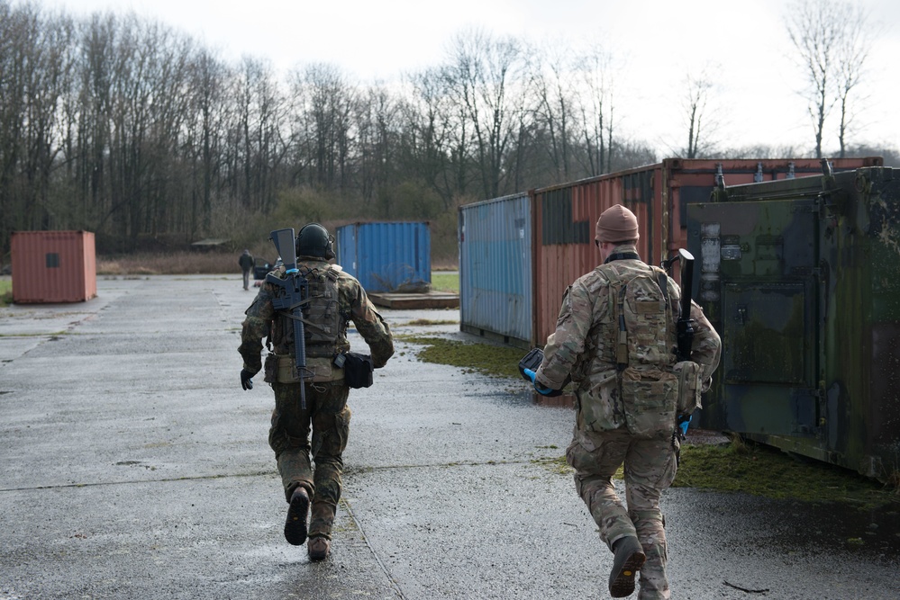 US Airmen role-play in a Special Operations Forces Training