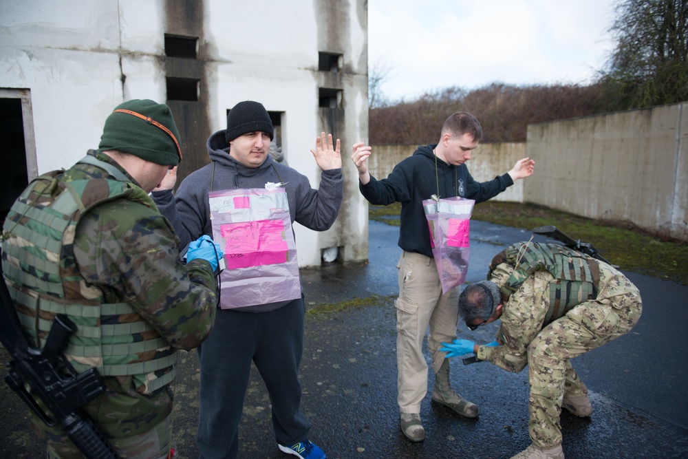 US Airmen role-play in a Special Operations Forces Training