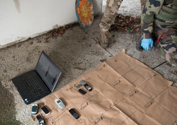 US Airmen role-play in a Special Operations Forces Training