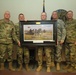 The South Carolina National Guard is presented with a painting commissioned by the U.S. Army War College class of 2015