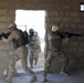 Iraqi army soldiers conduct room clearing, medical drills