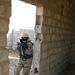 Iraqi army soldiers conduct room clearing, medical drills