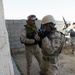Iraqi army soldiers conduct room clearing, medical drills